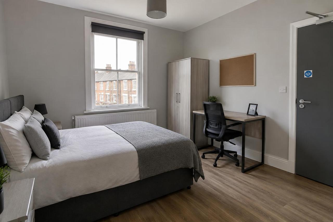 Illustrative image of a refurbished HMO bedroom in a UK terraced house