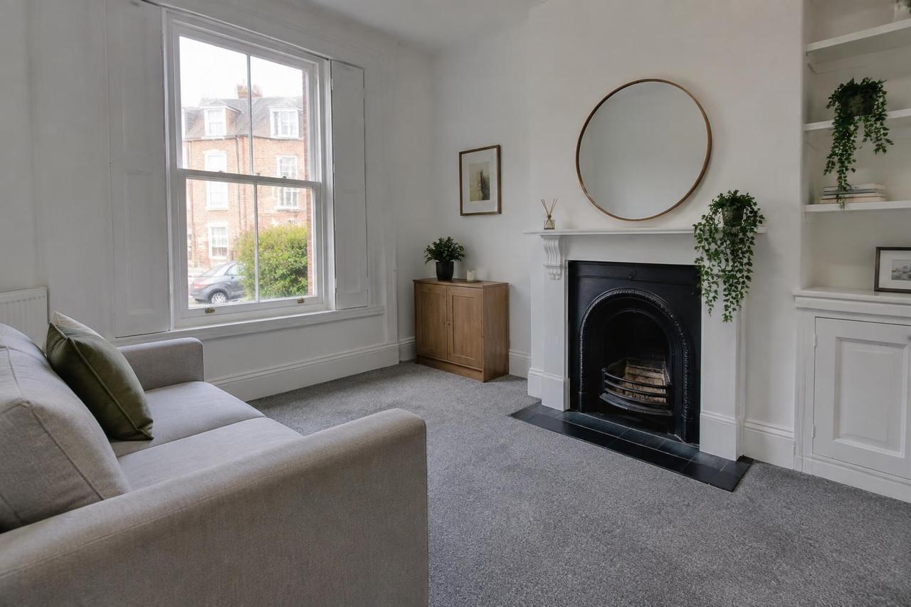 Illustrative image of a refurbished living room in a UK Victorian terraced house